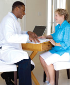 Female patient consulting with Male doctor about a Brow Lift